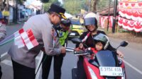 Sambut HUT RI ke-80, Polres Pekalongan Bagikan Bendera Merah Putih
